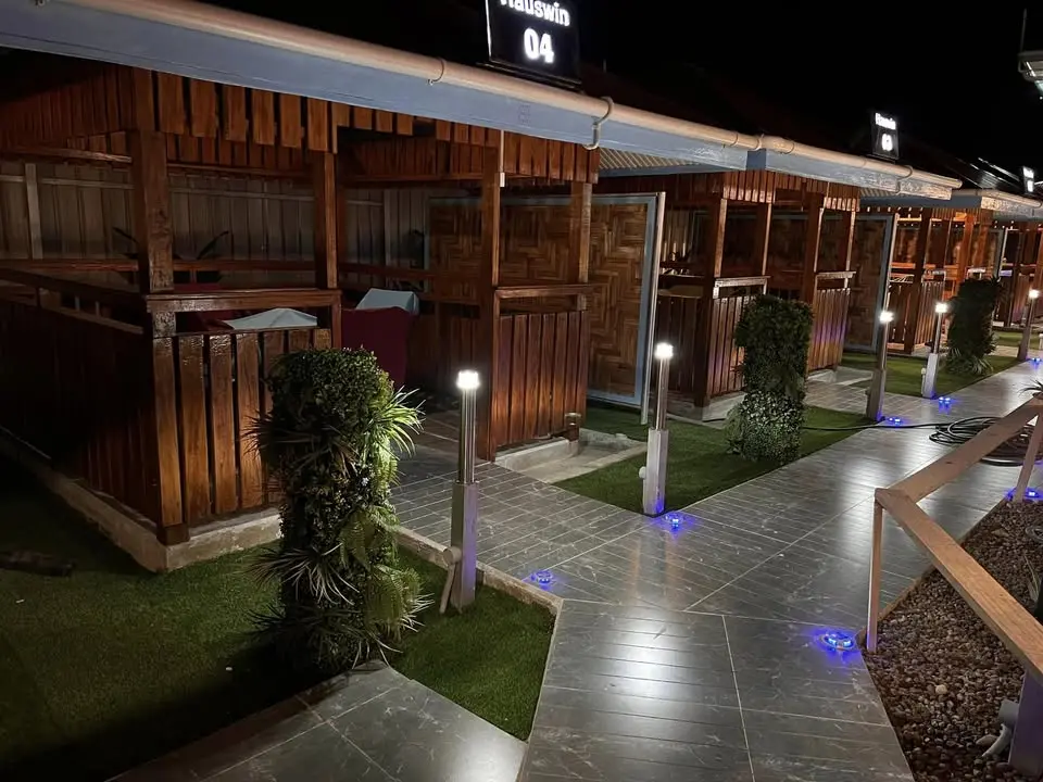 Bovotel accommodation illuminated at night in Arawa