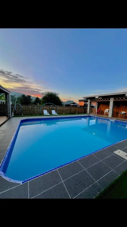 Bovotel swimming pool at dusk